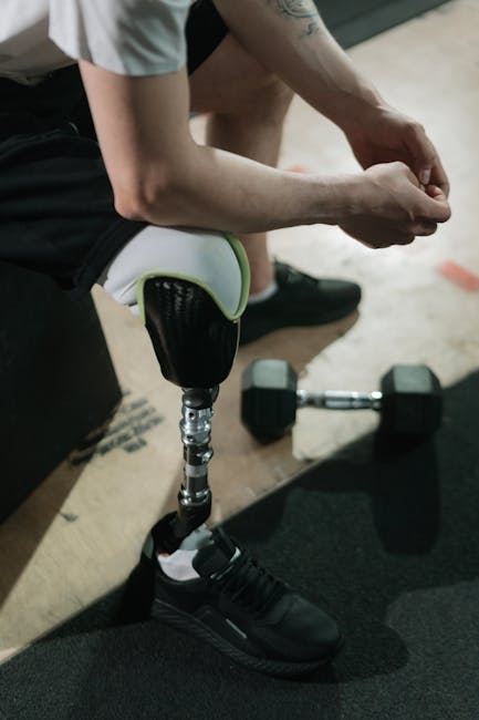 Athlete working with weights in a modern gym